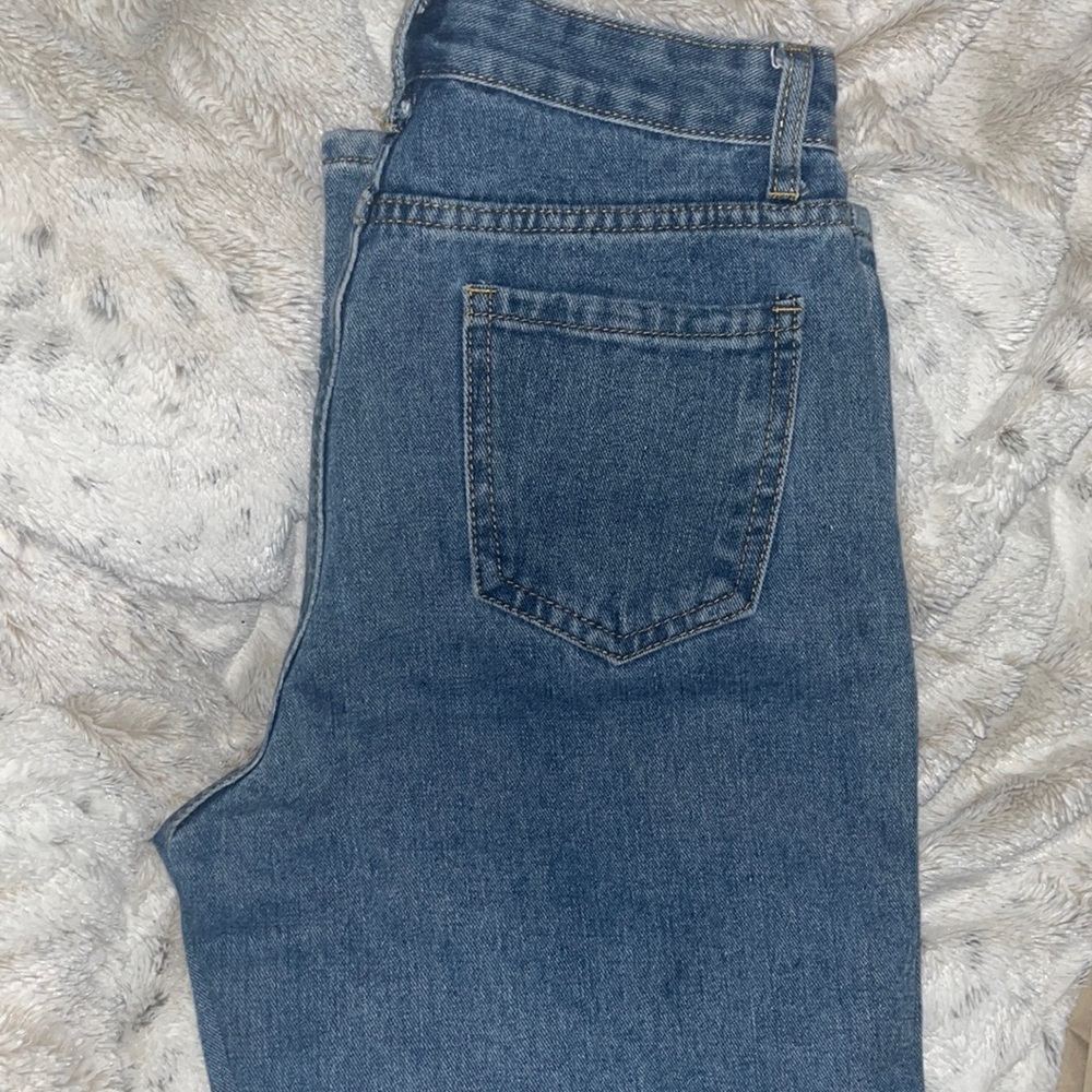 XS SHEIN ripped Denim rips on thigh and knee.